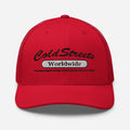 Red trucker-style baseball cap with ColdStreets Worldwide text, ideal for rustic fashion