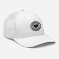 White mesh trucker cap with circular heart logo patch from CS Clothing Co. in black white pink