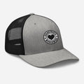 Gray and black trucker-style baseball cap with heart logo patch from CS Clothing Co