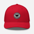 Red trucker cap with a black and white heart logo patch from CS Clothing Co