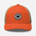 Orange and tan trucker cap with circular heart logo from CS Clothing Co. for black white pink fans