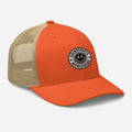 Orange and tan mesh trucker hat with smiley face patch for CS Clothing Co. styles