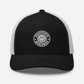 Black charcoal trucker-style baseball cap with smiley face logo patch from CS Clothing Co