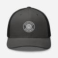 Gray and black trucker hat with circular smiley face logo from CS Clothing Co. HW1-t