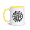 White ceramic mug with yellow handle featuring Coldstreets Worldwide logo and Statue of Liberty