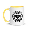 White ceramic mug with yellow handle and Coldstreets Worldwide logo in dark blue red