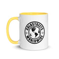 White coffee mug with yellow handle featuring Coldstreets Worldwide logo and globe design