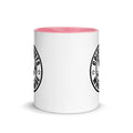 White ceramic mug with pink interior and black logo from CS Clothing Co. in blue pink golden