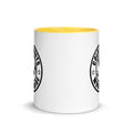 White ceramic mug with yellow interior and black logo from CS Clothing Co. in blue pink golden