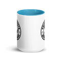 White ceramic mug with black logo and blue interior for CS Clothing Co. products