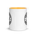 White ceramic mug with black logo and yellow interior from CS Clothing Co. in blue pink golden