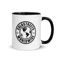 White ceramic mug with black handle featuring Coldstreets Worldwide logo and continents