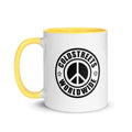 White coffee mug with yellow handle and black peace sign logo from CS Clothing Co