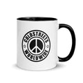 White ceramic mug with peace sign logo and Coldstreets Worldwide, dark blue red accents