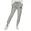 Light gray unisex sweatpants with elastic waistband, cuffed ankles, and logo patch from Cold Streets