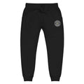 Black unisex sweatpants with embroidered logo patch from Cold Streets Clothing