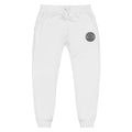 White unisex sweatpants with embroidered logo patch from Cold Streets Clothing