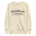 Cream-colored sweatshirt with Cold Streets New Hampshire text, perfect for Dusty Rose Team