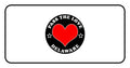 Black circular badge with red heart reading Pass The Love Delaware, surrounded by stars