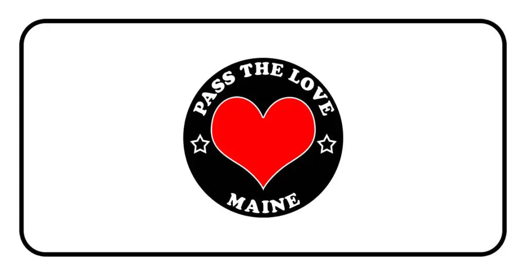 Black circular badge with Pass the Love Maine text and red heart, promoting love and Maine