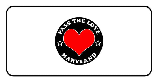 Black circular badge with Pass The Love Maryland text and red heart for clothing products