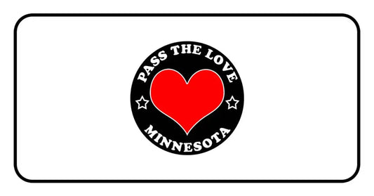 Black badge with red heart and Pass The Love Minnesota text, symbolizing love in Minnesota