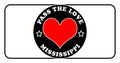 Black and white badge design with red heart and Pass The Love Mississippi text for clothing