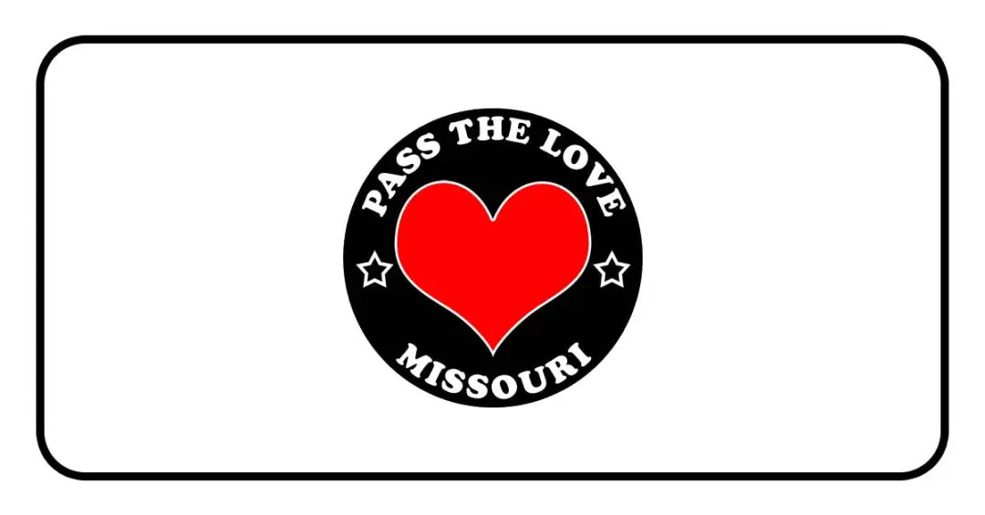 Black circular badge featuring Pass The Love Missouri text and a red heart for clothing