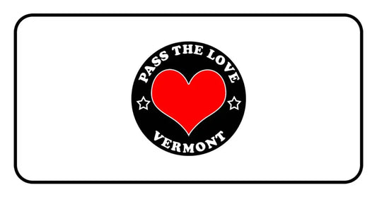 Black badge with red heart and stars for Pass The Love Vermont clothing and paid cards