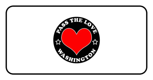 Red heart logo with Pass The Love Washington text in a circular design for clothing