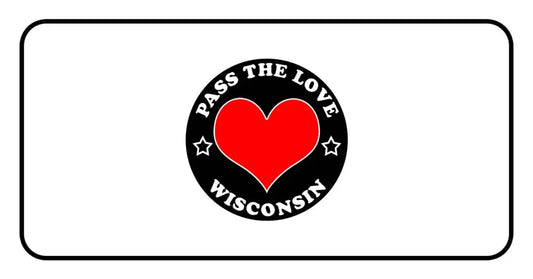 Black circular badge with red heart and text Pass The Love Wisconsin, stars accent included